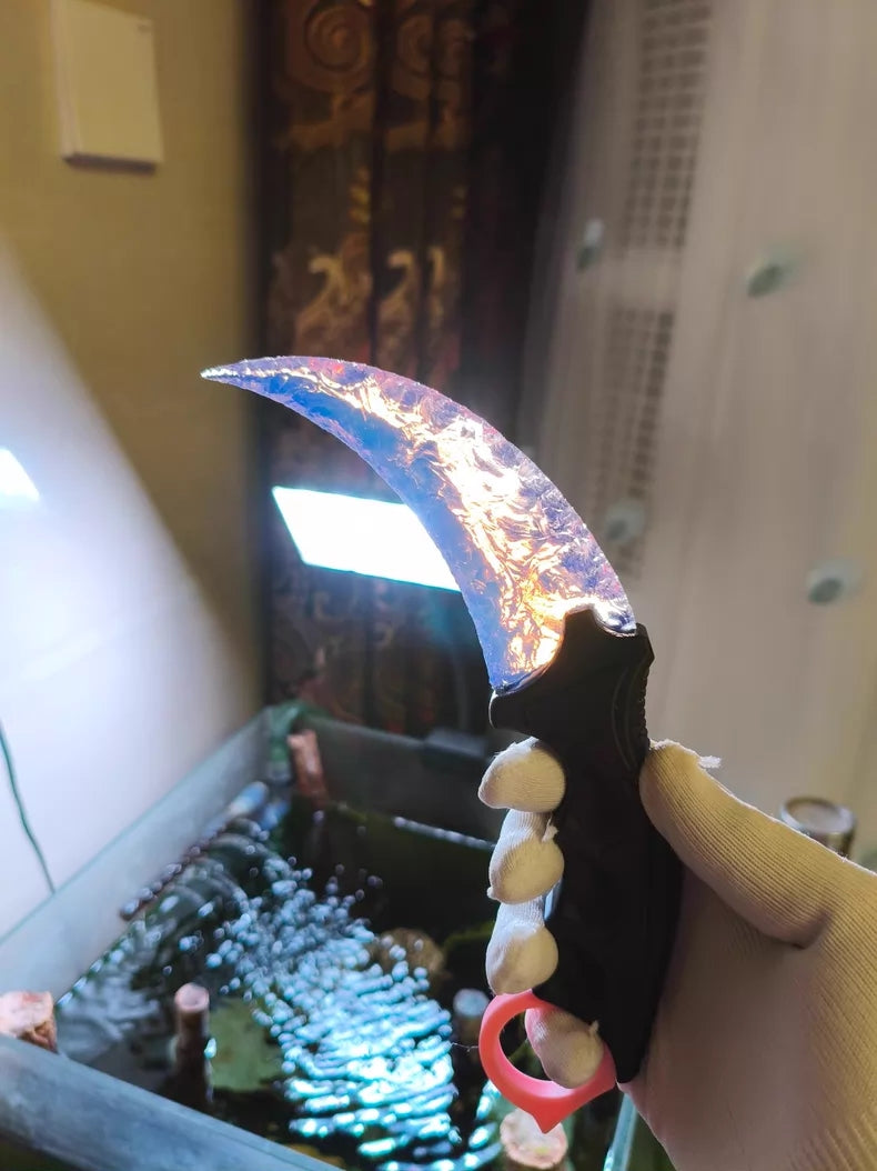 Chipped-style CS:GO Karambit with a pink opal-style 3D-printed handle; dreamy pink Karambit.