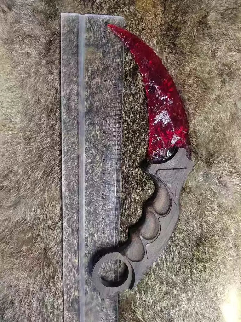 Chipped Stone Tool – Iridescent Ruby Karambit