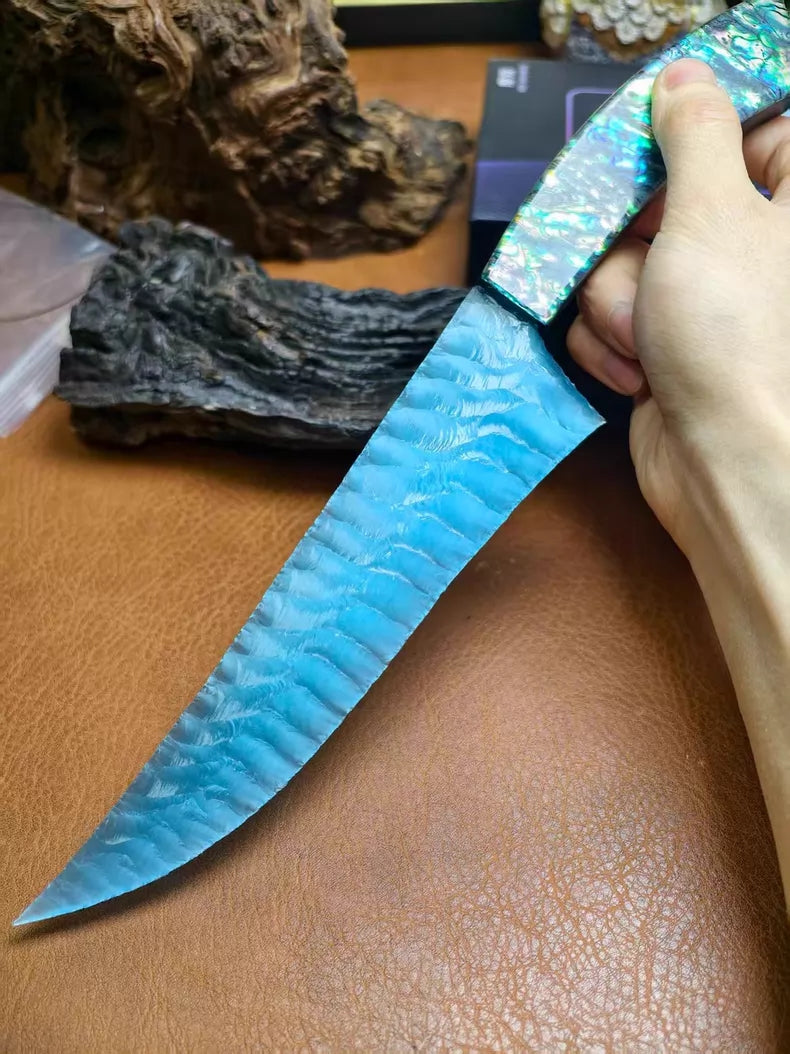 Flaked stone knife, pressure-flaked stone knife, hunting knife with a colorful shell handle and a sky-blue cat's-eye stone blade.