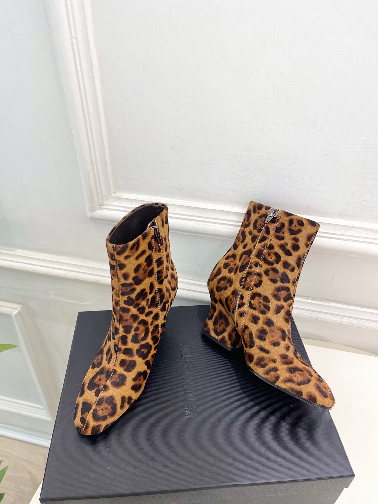 Jil Sander minimalist retro round-toe block-heel ankle boots in leopard print.