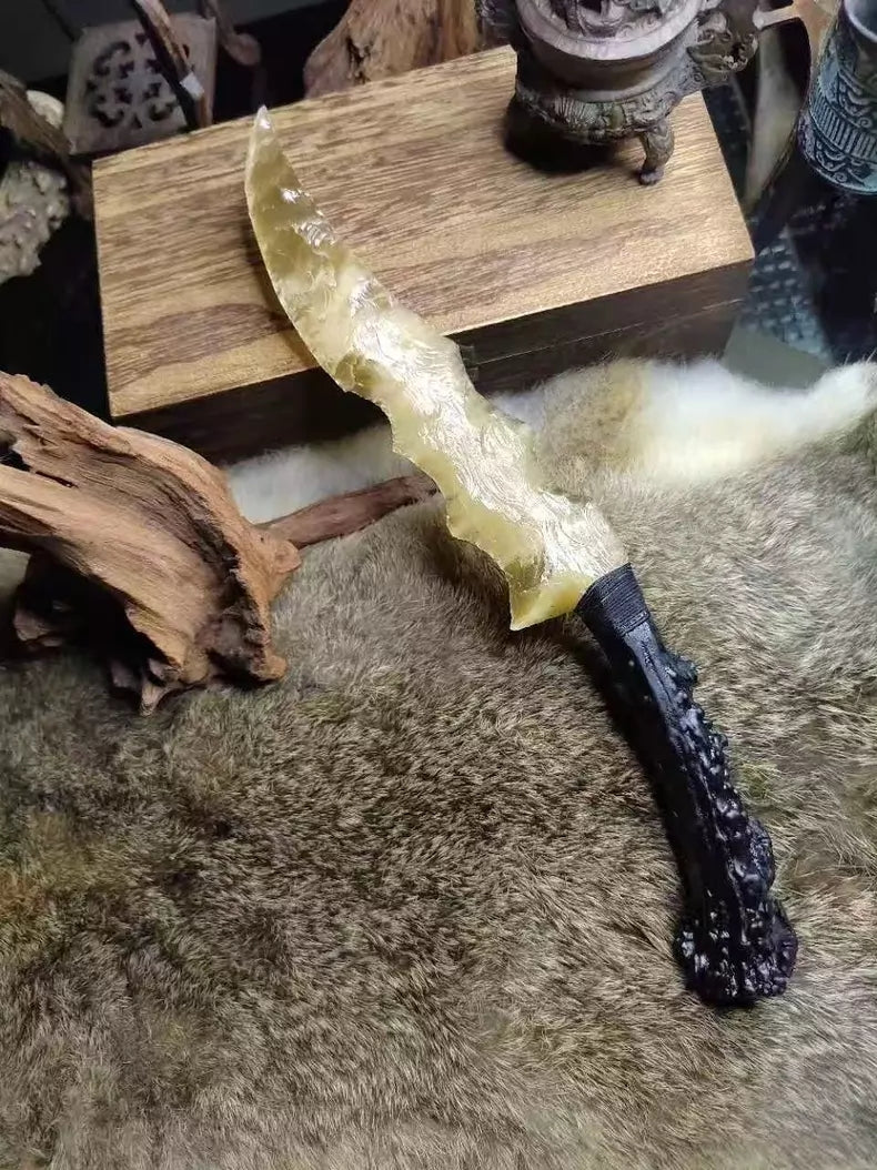 Knapped stone tools, stone knives, "Flame Blade," champagne-gold cat's-eye stone, dragon-crystal hunting knife, "Flame Blade," stone-bladed knife, obsidian knife, obsidian dragon-crystal blade — *Dragon Hunter: Gold Rush*