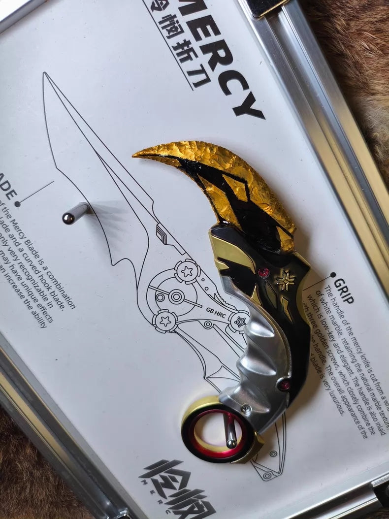 Hand-crafted stone tool replica: Valorant Champions 2021 Karambit (Mercy); obsidian-style hand-crafted stone base with a gold finish.